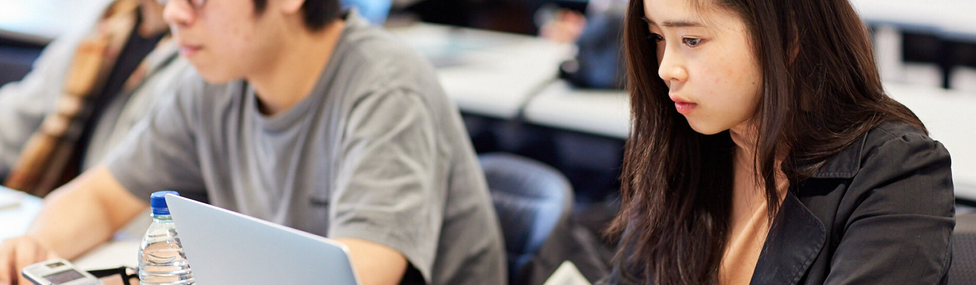 Students studying in library